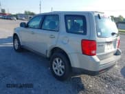 ✅ 2008 Mazda Tribute Sport • VIN: 4F2CZ02Z88KM19552 • Lot: 43024402. Listed on IAAI with 166,015 mi. Free auction sales archive from the USA and detailed vehicle history report at DreamBid. Image 3.