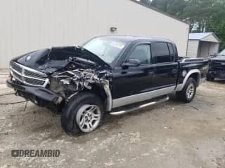2004 Dodge Dakota SLT z VIN 1D7HG48N64S594227, wystawiony jako Copart lot #62468295 z przebiegiem Nie podano mil oraz Szkoda całkowita • Salvage title. Historia ofert i sprzedaży dostępna na DreamBid. Obrazek 1.