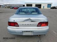 ✅ 1995 Toyota Camry LE • VIN: JT2GK12E7S0111308 • Lot: 66548415. Wystawiony na Copart z przebiegiem 237 050 mil. Bezpłatny archiwum sprzedaży aukcyjnych z USA i szczegółowy raport historii pojazdu na DreamBid. Zdjęcie 6.