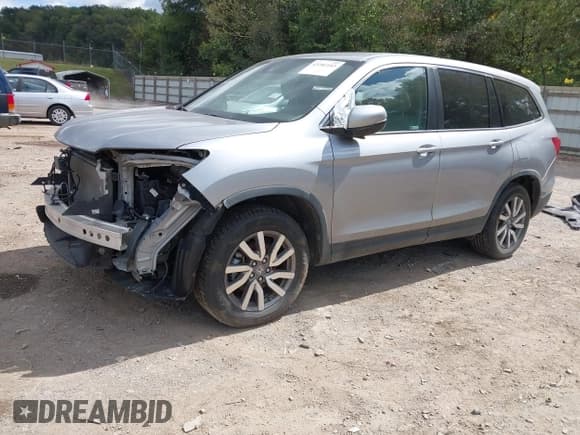 ✅ 2019 Honda Pilot EX-L • VIN: 5FNYF5H57KB031636 • Lot: 43281103. Listed on IAAI with 89,628 mi. Free auction sales archive from the USA and detailed vehicle history report at DreamBid. Image 17.
