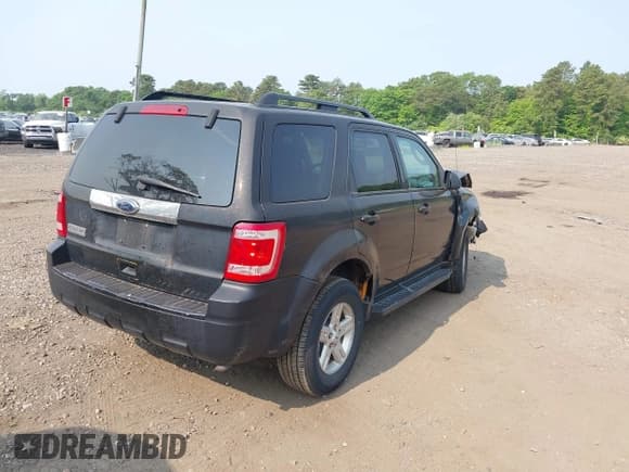 ✅ 2011 Ford Escape Hybrid • VIN: 1FMCU4K37BKA45651 • Lot: 42441757. Listed on IAAI with 504,073 mi. Free auction sales archive from the USA and detailed vehicle history report at DreamBid. Image 4.