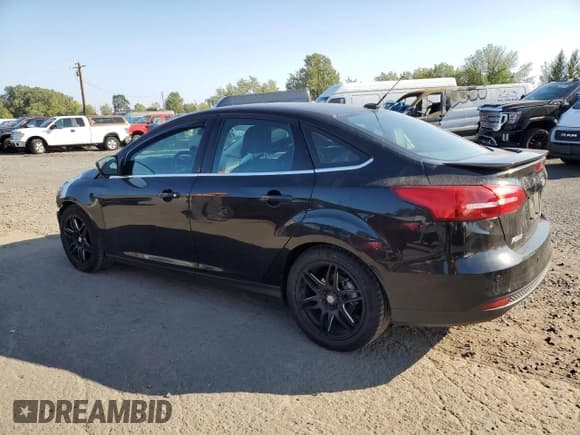 ✅ 2015 Ford Focus Titanium • VIN: 1FADP3J20FL315358 • Lot: 81679805. Listed on Copart with 80,847 mi. Free auction sales archive from the USA and detailed vehicle history report at DreamBid. Image 2.