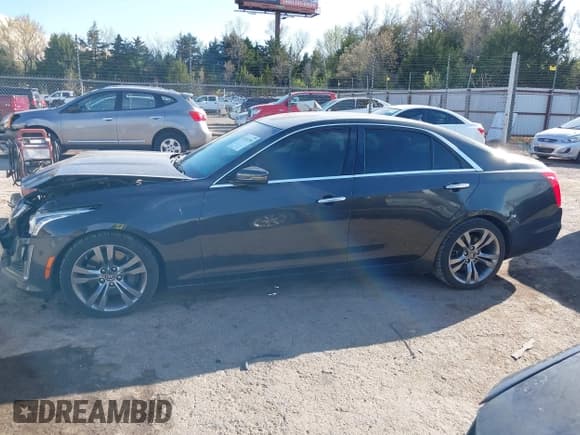 ✅ 2014 Cadillac CTS Vsport RWD • VIN: 1G6AU5S80E0188974 • Лот: 41915190. Опубликован ранее на IAAI с пробегом 103 623 миль. Бесплатный доступ к архиву аукционных продаж из США и подробный отчёт об истории автомобиля на DreamBid. Изображение 14.