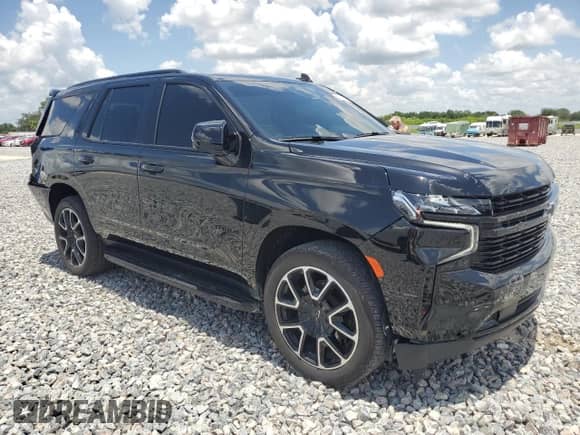 2024 Chevrolet Tahoe RST с VIN 1GNSCRKD7RR353761, выставлен на аукционе Copart как лот 60879495 с пробегом 14 455 миль миль и Списание • Salvage title. История ставок и продаж доступна на DreamBid. Изображение 4.