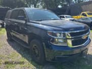 ✅ 2015 Chevrolet Tahoe Commercial • VIN: 1GNLC2EC6FR602058 • Lot: 61916965. Listed on Copart with 149,427 mi. Free auction sales archive from the USA and detailed vehicle history report at DreamBid. Image 1.