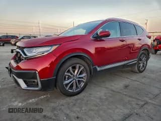 ✅ 2021 Honda CR-V Touring • VIN: 2HKRW2H99MH643976 • Lot: 94154765. Listed on Copart with 40,670 mi. Free auction sales archive from the USA and detailed vehicle history report at DreamBid. Image 1.