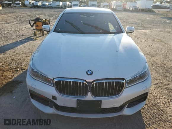 ✅ 2016 BMW 7 Series 750i xDrive • VIN: WBA7B0C59GG526741 • Lot: 86312384. Wystawiony na Copart z przebiegiem 90 360 mil. Bezpłatny archiwum sprzedaży aukcyjnych z USA i szczegółowy raport historii pojazdu na DreamBid. Zdjęcie 5.