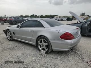 ✅ 2003 Mercedes-Benz SL 500 • VIN: WDBSK75F23F056336 • Лот: 61868014. Опубликован ранее на Copart с пробегом 160 211 миль. Бесплатный доступ к архиву аукционных продаж из США и подробный отчёт об истории автомобиля на DreamBid. Изображение 2.
