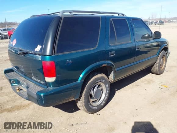 1998 Chevrolet Blazer LT with VIN 1GNDT13WXW2234455, listed as a IAAI auction lot 41672409 with 258,433 mi miles and . Bid and sale history available at DreamBid. Image 4.