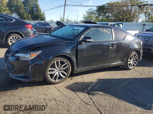 ✅ 2016 Scion tC • VIN: JTKJF5C79GJ014436 • Lot: 86107315. Listed on Copart with 115,686 mi. Free auction sales archive from the USA and detailed vehicle history report at DreamBid. Image 1.