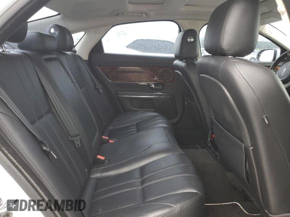 ✅ 2013 Jaguar XJ • VIN: SAJWJ1CD1D8V50182 • Lot: 68729285. Listed on Copart with 98,215 mi. Free auction sales archive from the USA and detailed vehicle history report at DreamBid. Image 10.