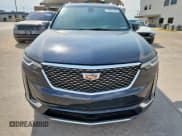 ✅ 2021 Cadillac XT6 Premium Luxury • VIN: 1GYKPCRS4MZ186440 • Лот: 71834115. Опубликован ранее на Copart с пробегом 33 835 миль. Бесплатный доступ к архиву аукционных продаж из США и подробный отчёт об истории автомобиля на DreamBid. Изображение 5.