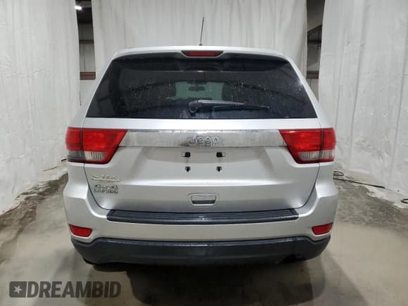 ✅ 2012 Jeep Grand Cherokee Laredo • VIN: 1C4RJFAG1CC120752 • Lot: 93726045. Listed on Copart with 207,479 mi. Free auction sales archive from the USA and detailed vehicle history report at DreamBid. Image 6.