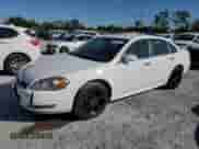 ✅ 2013 Chevrolet Impala LTZ • VIN: 2G1WC5E38D1215761 • Lot: 90534035. Listed on Copart with 205,467 mi. Free auction sales archive from the USA and detailed vehicle history report at DreamBid. Image 1.