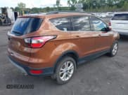 ✅ 2017 Ford Escape SE • VIN: 1FMCU9GD7HUD95311 • Lot: 43107508. Listed on IAAI with 95,785 mi. Free auction sales archive from the USA and detailed vehicle history report at DreamBid. Image 4.