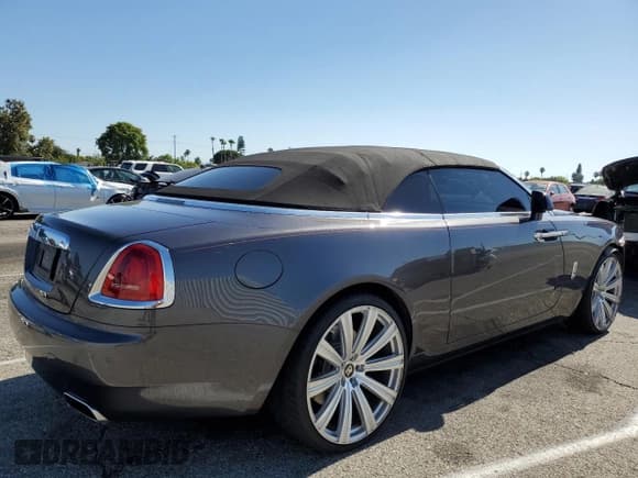 ✅ 2016 Rolls-Royce Dawn • VIN: SCA666D52GU102041 • Lot: 66655935. Listed on Copart with 10,462 mi. Free auction sales archive from the USA and detailed vehicle history report at DreamBid. Image 3.