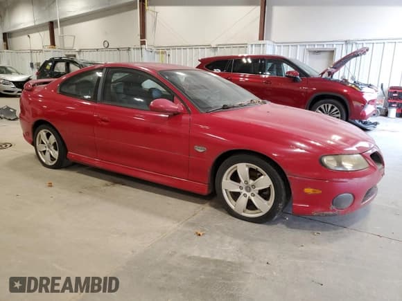 ✅ 2004 Pontiac GTO • VIN: 6G2VX12G94L313433 • Lot: 78669444. Wystawiony na Copart z przebiegiem 80 949 mil. Bezpłatny archiwum sprzedaży aukcyjnych z USA i szczegółowy raport historii pojazdu na DreamBid. Zdjęcie 4.