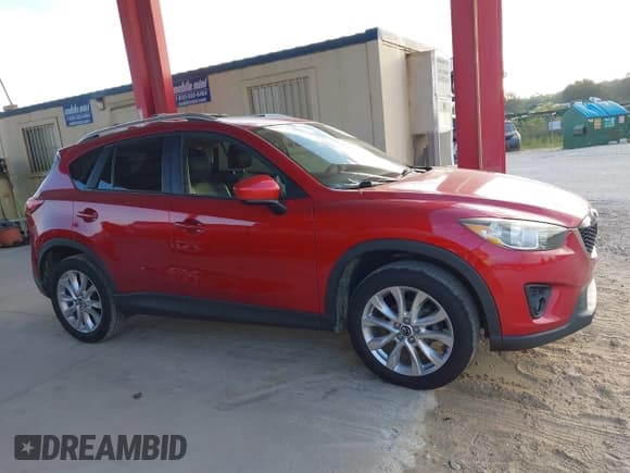✅ 2014 Mazda CX-5 Grand Touring • VIN: JM3KE4DY3E0424708 • Lot: 43349523. Wystawiony na IAAI z przebiegiem 75 283 mil. Bezpłatny archiwum sprzedaży aukcyjnych z USA i szczegółowy raport historii pojazdu na DreamBid. Zdjęcie 14.