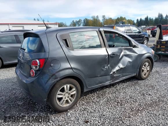 2013 Chevrolet Sonic LT with VIN 1G1JC6SG2D4148084, listed as a IAAI auction lot 43459236 with 94,963 mi miles and . Bid and sale history available at DreamBid. Image 4.