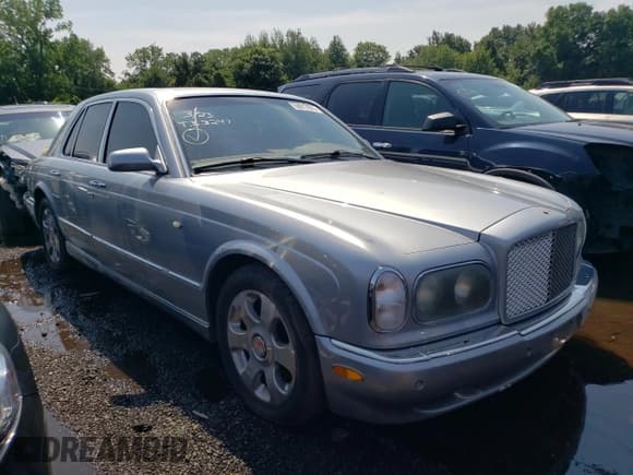 ✅ 2001 Bentley Arnage • VIN: SCBLC31E11CX06414 • Лот: 59017875. Опубликован ранее на Copart с пробегом 70 860 миль. Бесплатный доступ к архиву аукционных продаж из США и подробный отчёт об истории автомобиля на DreamBid. Изображение 4.
