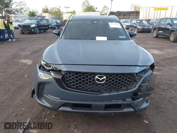 ✅ 2024 Mazda CX-50 S Select • VIN: 7MMVABAM4RN164044 • Lot: 43440389. Listed on IAAI with 26,914 mi. Free auction sales archive from the USA and detailed vehicle history report at DreamBid. Image 12.