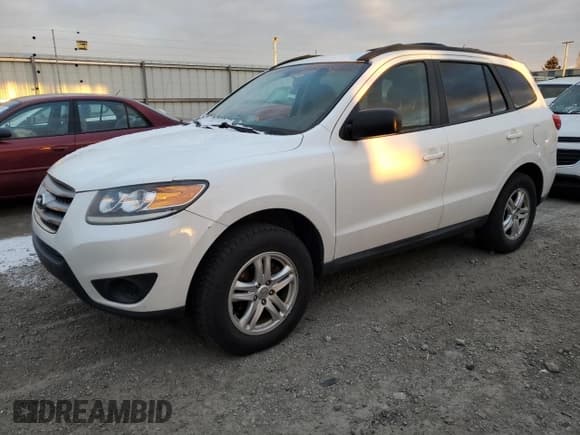 ✅ 2012 Hyundai Santa Fe GLS • VIN: 5XYZGDAB8CG118659 • Lot: 83682914. Listed on Copart with 174,014 mi. Free auction sales archive from the USA and detailed vehicle history report at DreamBid. Image 1.