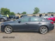 ✅ 2015 Mazda 6 i Touring • VIN: JM1GJ1V5XF1193105 • Lot: 42925241. Listed on IAAI with 160,165 mi. Free auction sales archive from the USA and detailed vehicle history report at DreamBid. Image 14.