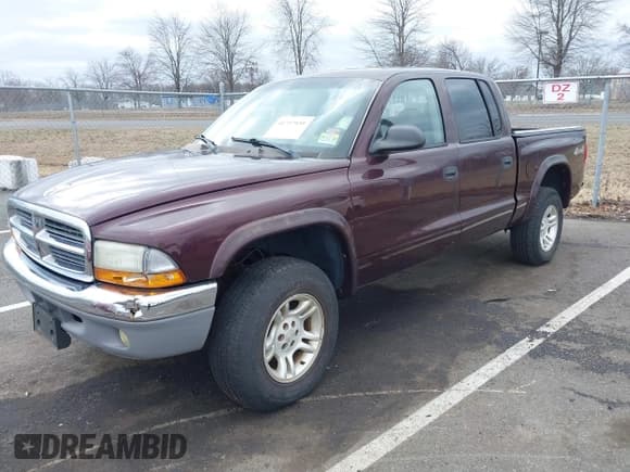 ✅ 2004 Dodge Dakota SLT • VIN: 1D7HG48NX4S751497 • Lot: 41737935. Wystawiony na IAAI z przebiegiem 106 064 mil. Bezpłatny archiwum sprzedaży aukcyjnych z USA i szczegółowy raport historii pojazdu na DreamBid. Zdjęcie 2.