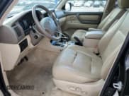 ✅ 2004 Toyota Land Cruiser • VIN: JTEHT05J842065910 • Lot: 63325695. Wystawiony na Copart z przebiegiem 235 759 mil. Bezpłatny archiwum sprzedaży aukcyjnych z USA i szczegółowy raport historii pojazdu na DreamBid. Zdjęcie 7.