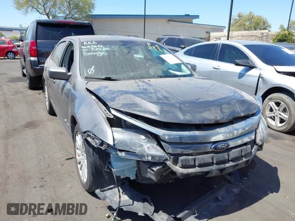 ✅ 2010 Ford Fusion Hybrid • VIN: 3FADP0L38AR221680 • Lot: 43175219. Wystawiony na IAAI z przebiegiem 215 650 mil. Bezpłatny archiwum sprzedaży aukcyjnych z USA i szczegółowy raport historii pojazdu na DreamBid. Zdjęcie 6.