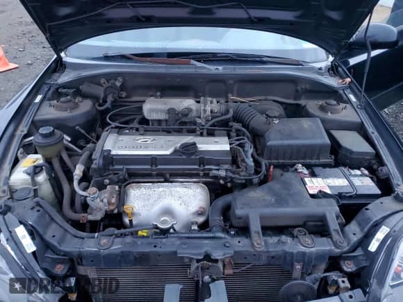 2004 Hyundai Accent GL with VIN KMHCG35CX4U312284, listed as a Copart auction lot 83992384 with 88,786 mi miles and Salvage title. Bid and sale history available at DreamBid. Image 11.