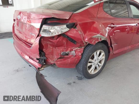 ✅ 2012 Kia Optima EX • VIN: 5XXGN4A64CG014206 • Lot: 42700120. Listed on IAAI with 121,802 mi. Free auction sales archive from the USA and detailed vehicle history report at DreamBid. Image 6.