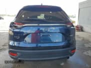 ✅ 2022 Mazda CX-9 Touring Plus • VIN: JM3TCBAYXN0607056 • Lot: 61740065. Listed on Copart with 59,281 mi. Free auction sales archive from the USA and detailed vehicle history report at DreamBid. Image 6.