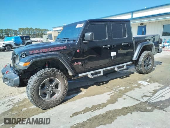 ✅ 2022 Jeep Gladiator Rubicon • VIN: 1C6JJTBG6NL106690 • Lot: 74349764. Wystawiony na Copart z przebiegiem 20 583 mil. Bezpłatny archiwum sprzedaży aukcyjnych z USA i szczegółowy raport historii pojazdu na DreamBid. Zdjęcie 1.