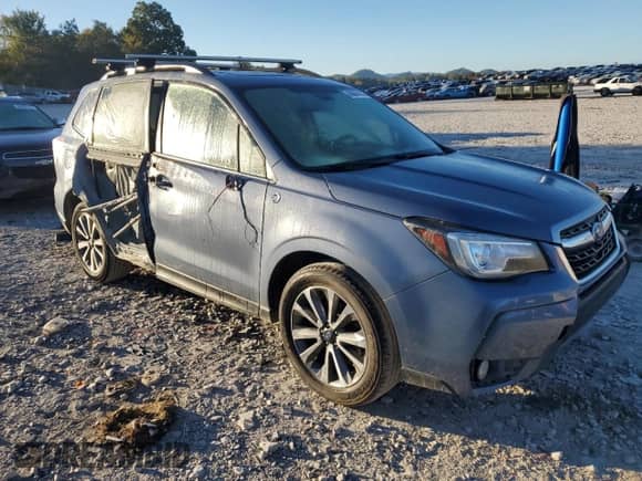 2018 Subaru Forester Touring с VIN JF2SJGWC4JH535224, выставлен на аукционе Copart как лот 86684145 с пробегом 100 969 миль миль и Списание • Salvage title. История ставок и продаж доступна на DreamBid. Изображение 4.