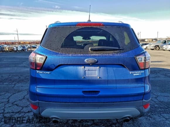✅ 2017 Ford Escape Titanium • VIN: 1FMCU9J99HUE98024 • Lot: 93474425. Listed on Copart with 86,014 mi. Free auction sales archive from the USA and detailed vehicle history report at DreamBid. Image 6.