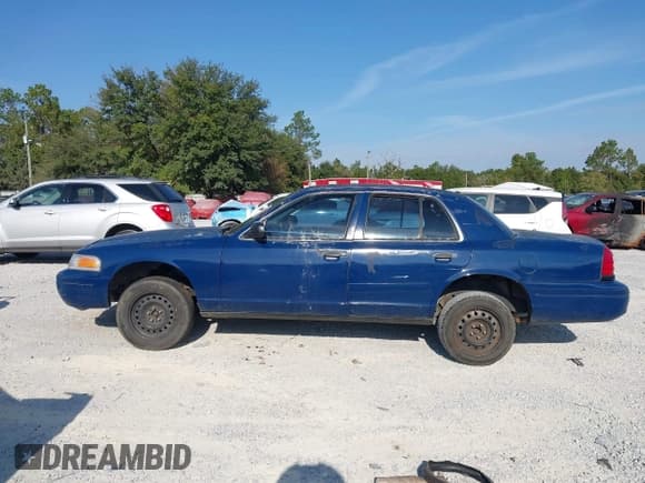 ✅ 2002 Ford Police Interceptor • VIN: 2FAFP71W72X157701 • Lot: 43719670. Listed on IAAI with 155,894 mi. Free auction sales archive from the USA and detailed vehicle history report at DreamBid. Image 14.