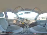 ✅ 2004 Ford Focus LX • VIN: 1FAFP33P64W171988 • Lot: 93232465. Listed on Copart with 161,672 mi. Free auction sales archive from the USA and detailed vehicle history report at DreamBid. Image 15.