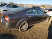 ✅ 2010 Chevrolet Malibu LTZ • VIN: 1G1ZE5EB2A4138903 • Lot: 82869924. Listed on Copart with 197,508 mi. Free auction sales archive from the USA and detailed vehicle history report at DreamBid. Image 3.