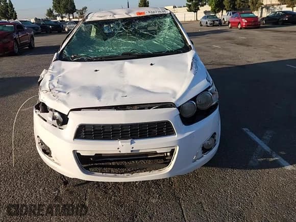 ✅ 2014 Chevrolet Sonic LTZ • VIN: 1G1JE5SG1E4127653 • Lot: 93331635. Listed on Copart with Not provided. Free auction sales archive from the USA and detailed vehicle history report at DreamBid. Image 13.