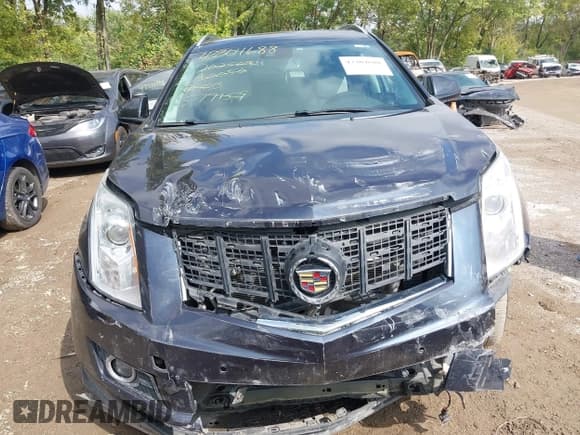 ✅ 2016 Cadillac SRX Performance Collection • VIN: 3GYFNCE38GS577159 • Lot: 43304688. Listed on IAAI with 110,526 mi. Free auction sales archive from the USA and detailed vehicle history report at DreamBid. Image 12.