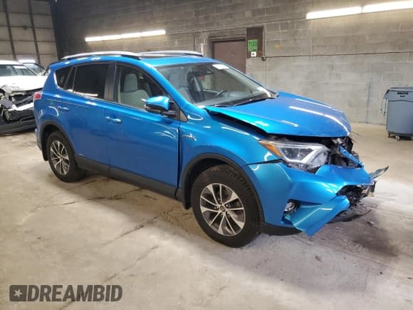 ✅ 2018 Toyota RAV4 Hybrid XLE • VIN: JTMRJREV4JD221155 • Лот: 52434395. Опубликован ранее на Copart с пробегом 102 160 миль. Бесплатный доступ к архиву аукционных продаж из США и подробный отчёт об истории автомобиля на DreamBid. Изображение 4.