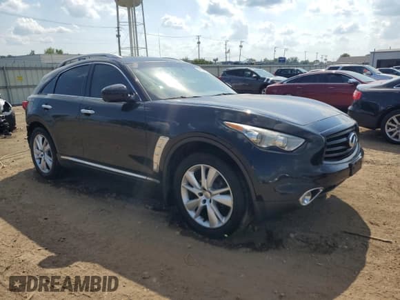 ✅ 2015 Infiniti QX70 • VIN: JN8CS1MWXFM483160 • Lot: 67914015. Listed on Copart with 80,132 mi. Free auction sales archive from the USA and detailed vehicle history report at DreamBid. Image 4.
