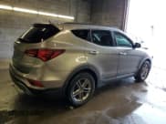 ✅ 2018 Hyundai Santa Fe 2.4L • VIN: 5NMZUDLB5JH069977 • Лот: 38550574. Опубликован ранее на Copart с пробегом 64 463 миль. Бесплатный доступ к архиву аукционных продаж из США и подробный отчёт об истории автомобиля на DreamBid. Изображение 3.