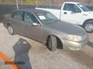 ✅ 2003 Saturn LS • VIN: 1G8JU54FX3Y556207 • Lot: 43731223. Listed on IAAI with 129,019 mi. Free auction sales archive from the USA and detailed vehicle history report at DreamBid. Image 1.