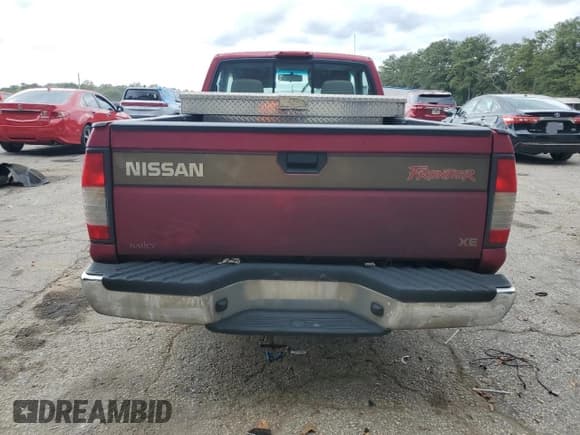 ✅ 1998 Nissan Frontier XE • VIN: 1N6DD21S3WC343701 • Lot: 85781925. Listed on Copart with 287,967 mi. Free auction sales archive from the USA and detailed vehicle history report at DreamBid. Image 6.