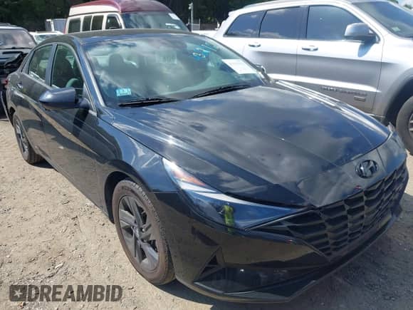 2021 Hyundai Elantra SEL z VIN 5NPLM4AG9MH043281, wystawiony jako IAAI lot #43223112 z przebiegiem 24 902 mil mil oraz . Historia ofert i sprzedaży dostępna na DreamBid. Obrazek 1.