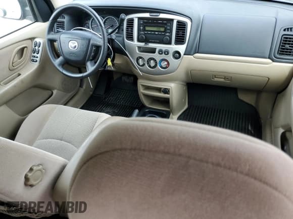 ✅ 2004 Mazda Tribute LX • VIN: 4F2YZ94164KM25510 • Lot: 84049804. Listed on Copart with 111,929 mi. Free auction sales archive from the USA and detailed vehicle history report at DreamBid. Image 8.