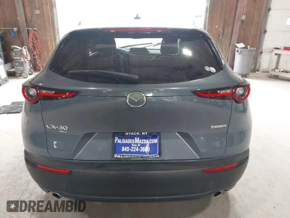 ✅ 2021 Mazda CX-30 Premium • VIN: 3MVDMBDM4MM217681 • Лот: 43559075. Опубликован ранее на IAAI с пробегом 49 118 миль. Бесплатный доступ к архиву аукционных продаж из США и подробный отчёт об истории автомобиля на DreamBid. Изображение 16.