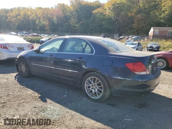 ✅ 2005 Acura RL • VIN: JH4KB16535C017200 • Лот: 76689214. Опубликован ранее на Copart с пробегом Не указан. Бесплатный доступ к архиву аукционных продаж из США и подробный отчёт об истории автомобиля на DreamBid. Изображение 2.